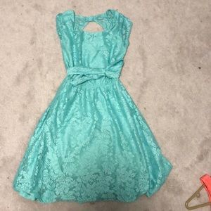 Beautiful turquoise girls dress, high back, lots of coverage and still very cute